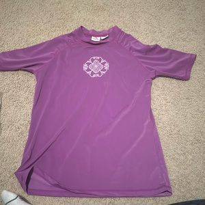 Kanu swim shirt. Size medium in a purple